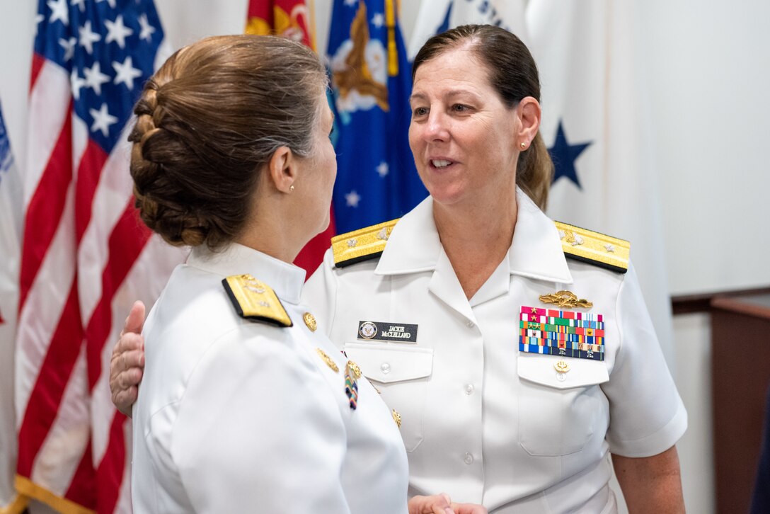 Family and friends of Navy Rear Adm. Kristen Fabry gather for a light breakfast prior to the Defense Logistics Agency Land and Maritime Change of Command and Retirement Ceremony July 22. Fabry is retiring this month after 31 years of service in the Navy.