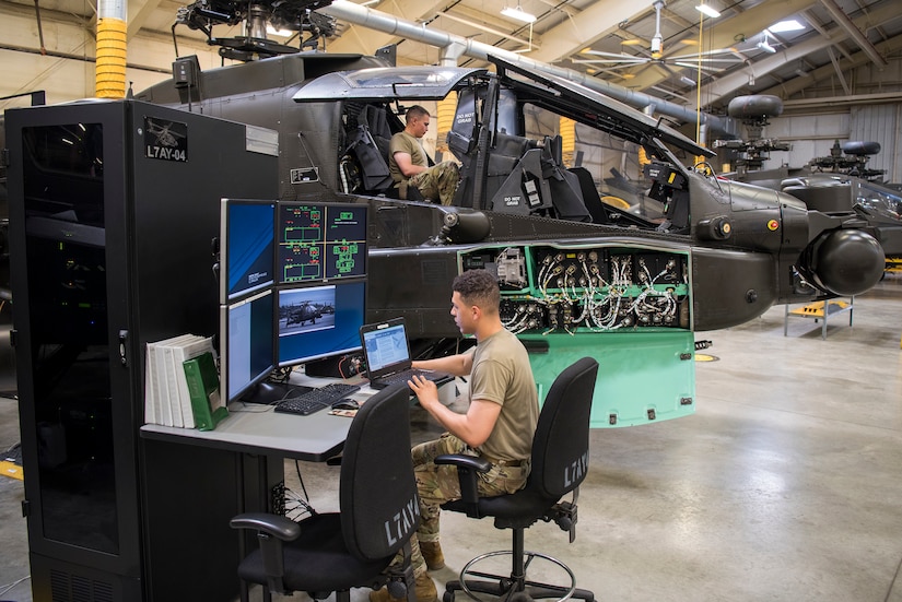 Soldiers train on a weapons system.