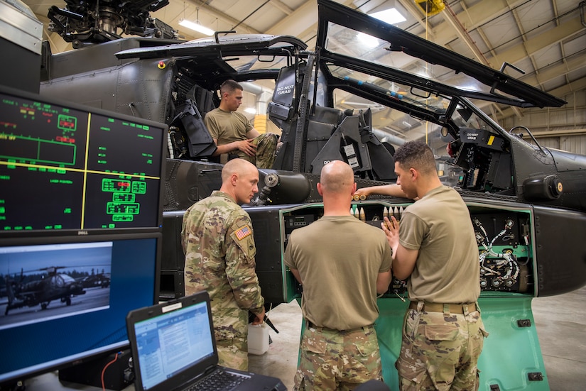 Soldiers train on a weapons system.