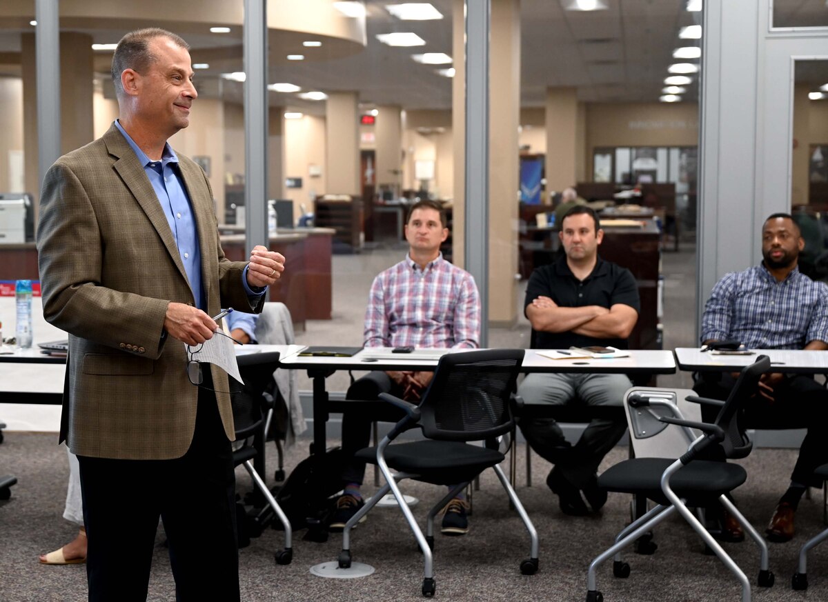 a man speaks to a group