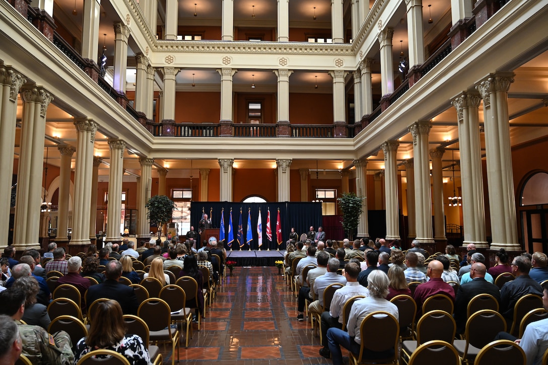 Crowd of people observe the St. Paul District change of command