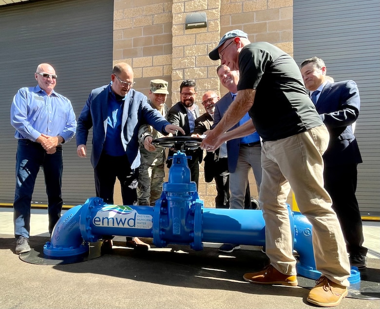 Lt. Col. Jeffrey Beeman, third from left, deputy commander of the U.S. Army Corps of Engineers Los Angeles District, joins representatives from the Eastern Municipal Water District, the State Water Resources Control Board, the City of Menifee and the Metropolitan Water District of Southern California to “open the valve” on the Perris II Reverse Osmosis Treatment Facility in Menifee, California.