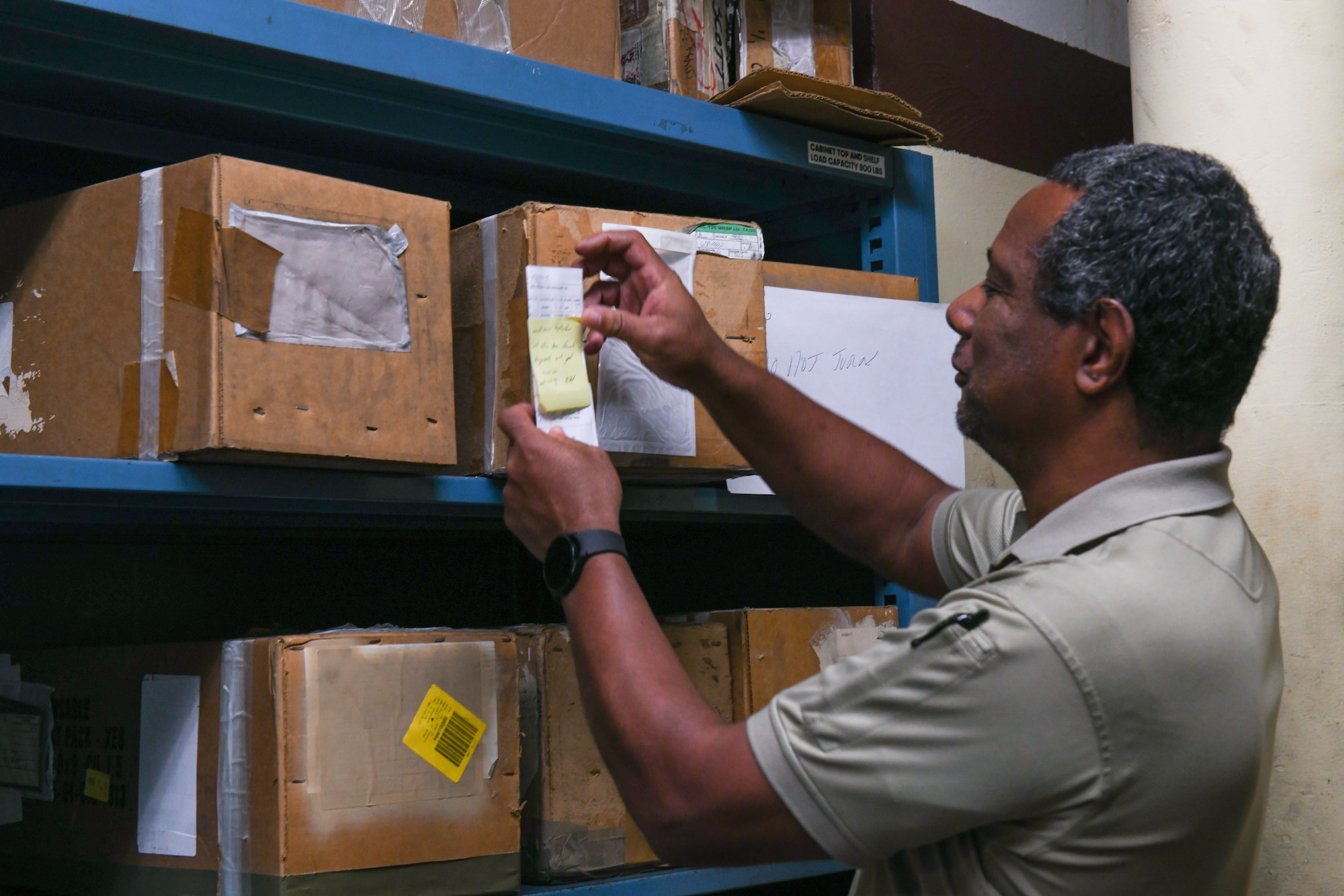 Peter Chase, 97th Maintenance Squadron (MXS) hydraulic section supervisor, checks inventory at Altus Air Force Base (AFB), Oklahoma, July 27, 2022. The 97th MXS received 25 hydraulic actuators from Hill AFB, Utah, to repair in order to keep the fleet operational. (U.S. Air Force photo by Airman 1st Class Miyah Gray)