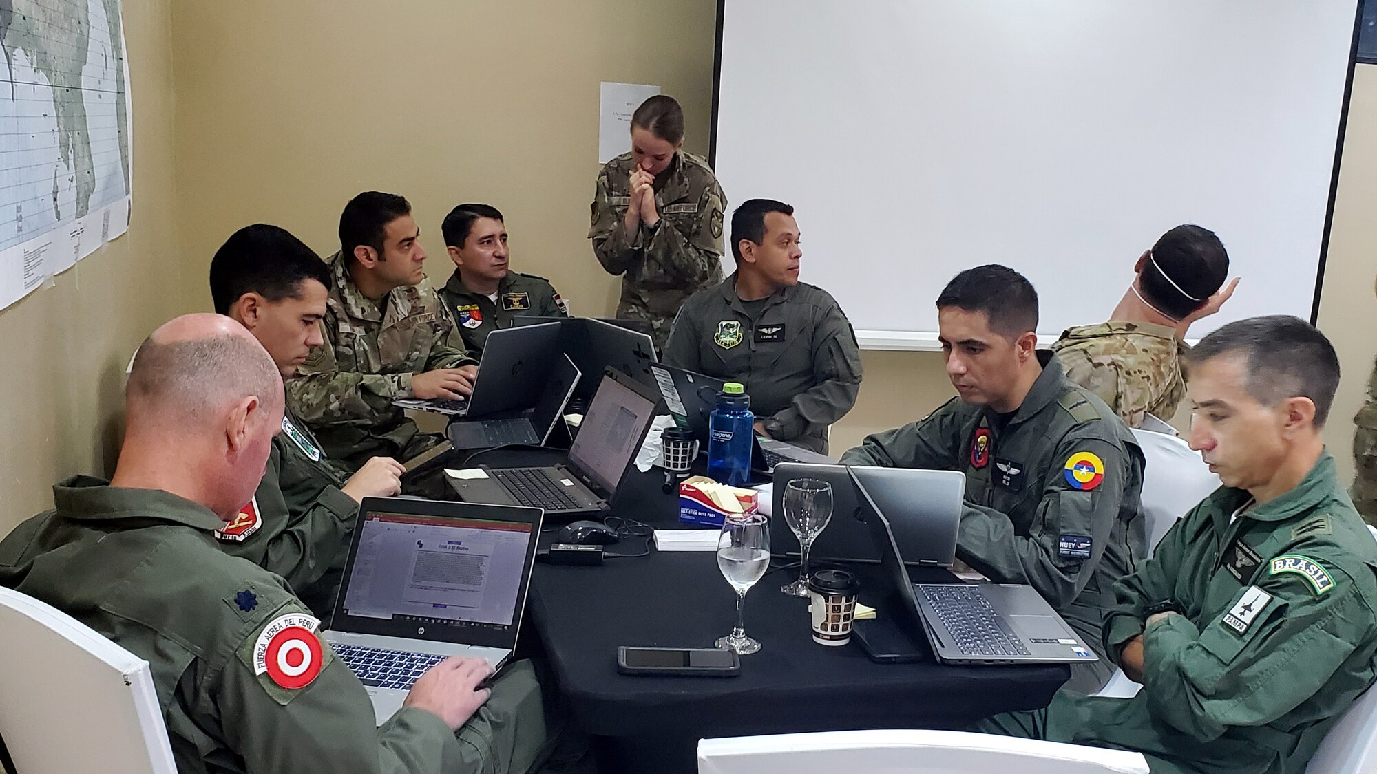 Lt. Col. David Keck and Lt. Col. Charlie Shaw joined air component planners from 10 Caribbean and Latin American countries to aid in coordinating joint operations for the upcoming PANAMAX 2022 exercise.