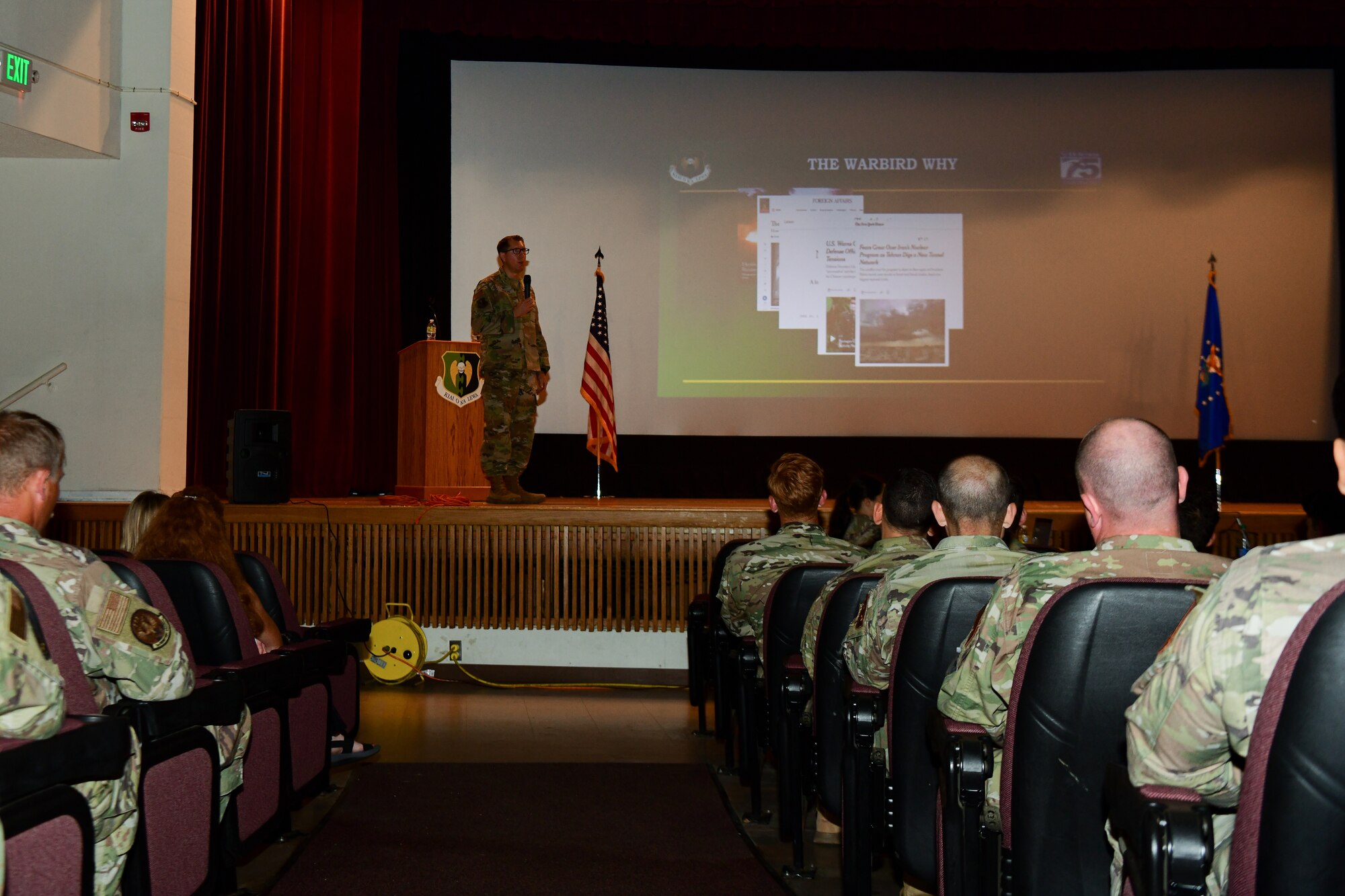 Col. Daniel Hoadley, 5th Bomb Wing Commander, espouses upon the importance of Airmen core values at an all call at the base theater on Minot Air Force Base, North Dakota, July 25, 2022. The all calls provided an opportunity for 5th BW leadership to convey their intent while addressing Airmen’s questions. (U.S. Air Force photo by Airman Alysa Knott)