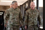 Two military men walking in uniform