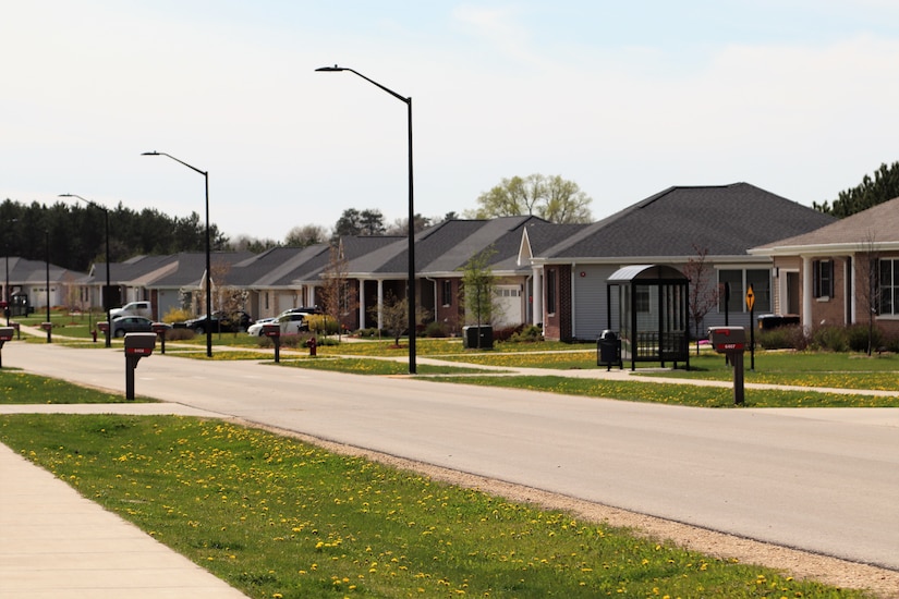 Homes line a street on a military base.