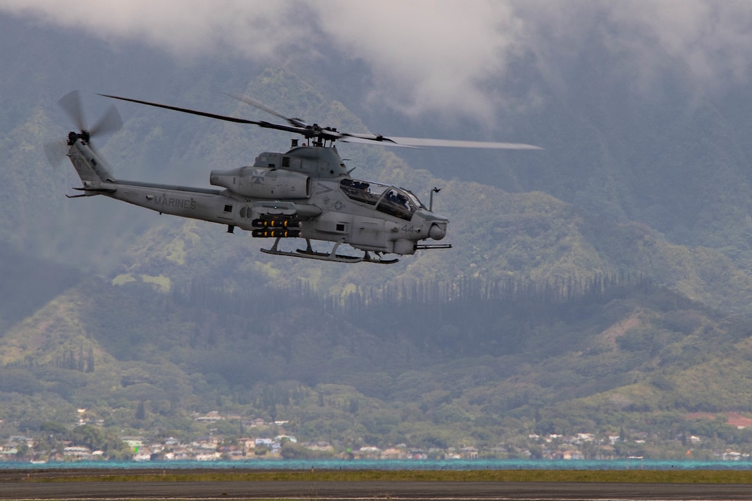 220722-M-WE079-1229

MARINE CORPS AIR STATION KANEOHE BAY, Hawaii (July 22, 2022) A U.S. Marine Corps AH-1 Super Cobra participates in a sink exercise (SINKEX) during Rim of the Pacific (RIMPAC) 2022, from Marine Corps Air Station Kaneohe Bay, Hawaii. RIMPAC military forces fired upon and sunk the decommissioned ex-USS Denver (LPD 9), July 22, during a SINKEX to gain proficiency in tactics, targeting and live firing against a surface target at sea. SINKEX vessels are put through a certified cleaning process, including removing all environmentally harmful material including trash, floatable material, mercury, fluorocarbon and petroleum. Twenty-six nations, 38 ships, three submarines, more than 170 aircraft and 25,000 personnel are participating in RIMPAC from June 29 to Aug. 4 in and around the Hawaiian Islands and Southern California. The world's largest international maritime exercise, RIMPAC provides a unique training opportunity while fostering and sustaining cooperative relationships among participants critical to ensuring the safety of sea lanes and security on the world's oceans. RIMPAC 2022 is the 28th exercise in the series that began in 1971. (Courtesy photo by U.S. Marine Corps Lance Cpl. Tyler Andrews)