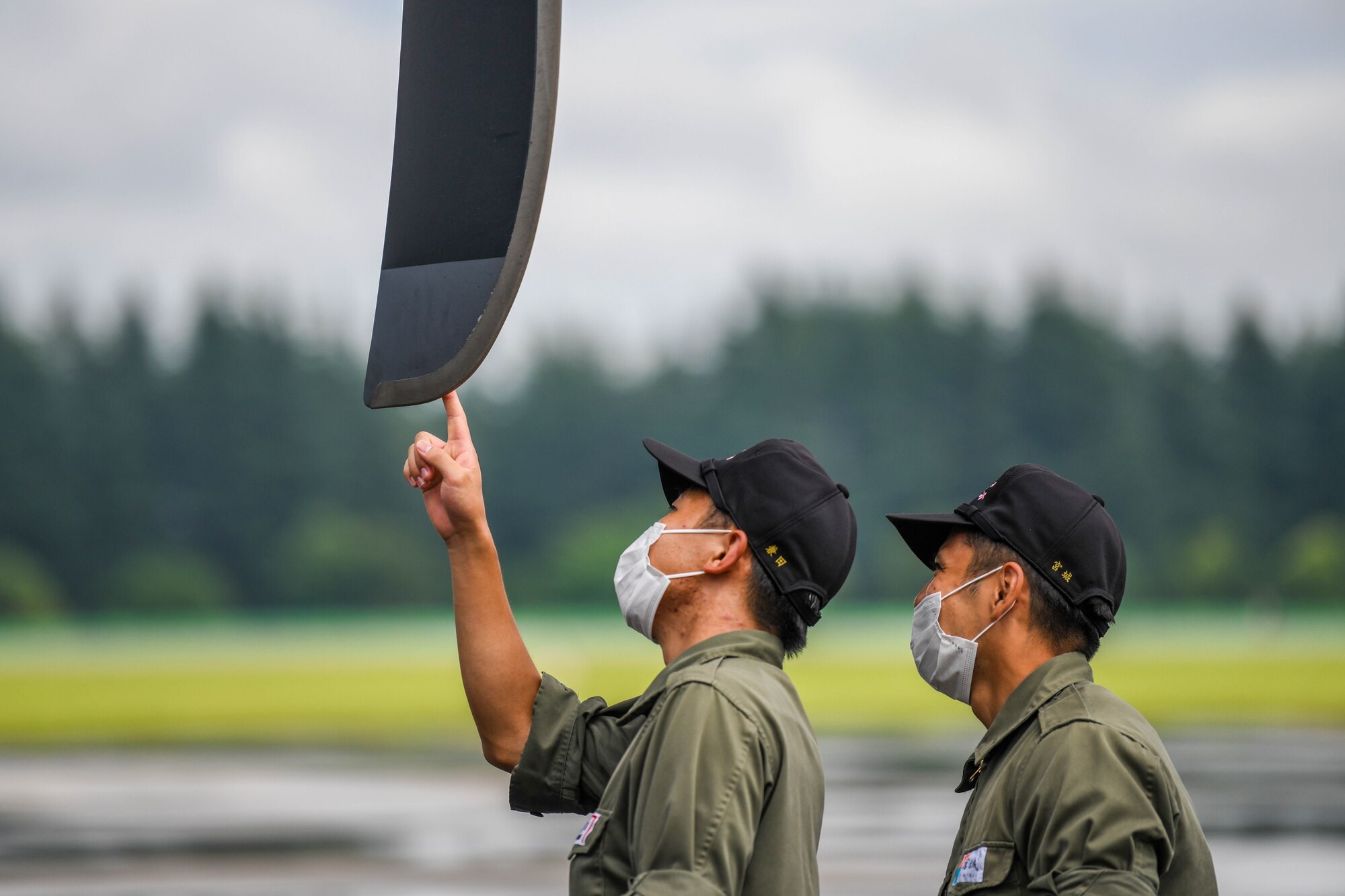 Cadets inspect a C-130J propeller blade
