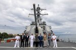 220725-N-HP061-0038 BRUNEI (July 25, 2022) Command Master Chief Alan Benavidez, Commanding Officer Cmdr. Joseph McGettigan, and Executive Officer Cameron Dennis, pose for a photo with a group of distinguished visitors on the fo’c’sle aboard Arleigh Burke-class guided-missile destroyer USS Higgins (DDG 76) as part of a ship tour during a scheduled port visit to Brunei, July 25. Higgins is assigned to Commander, Task Force 71/Destroyer Squadron (DESRON) 15, the Navy’s largest forward-deployed DESRON and the U.S. 7th Fleet’s principal surface force. (U.S. Navy photo by Mass Communication Specialist 1st Class Donavan K. Patubo)