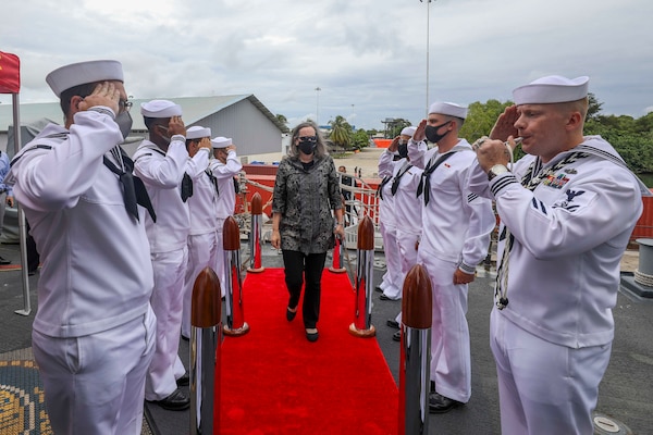 220725-N-HP061-0004 BRUNEI (July 25, 2022) United States Ambassador to Brunei, Caryn R. McClelland, arrives on the quarterdeck aboard Arleigh Burke-class guided-missile destroyer USS Higgins (DDG 76) for a ship tour during a scheduled port visit to Brunei, July 25. Higgins is assigned to Commander, Task Force 71/Destroyer Squadron (DESRON) 15, the Navy’s largest forward-deployed DESRON and the U.S. 7th Fleet’s principal surface force. (U.S. Navy photo by Mass Communication Specialist 1st Class Donavan K. Patubo)