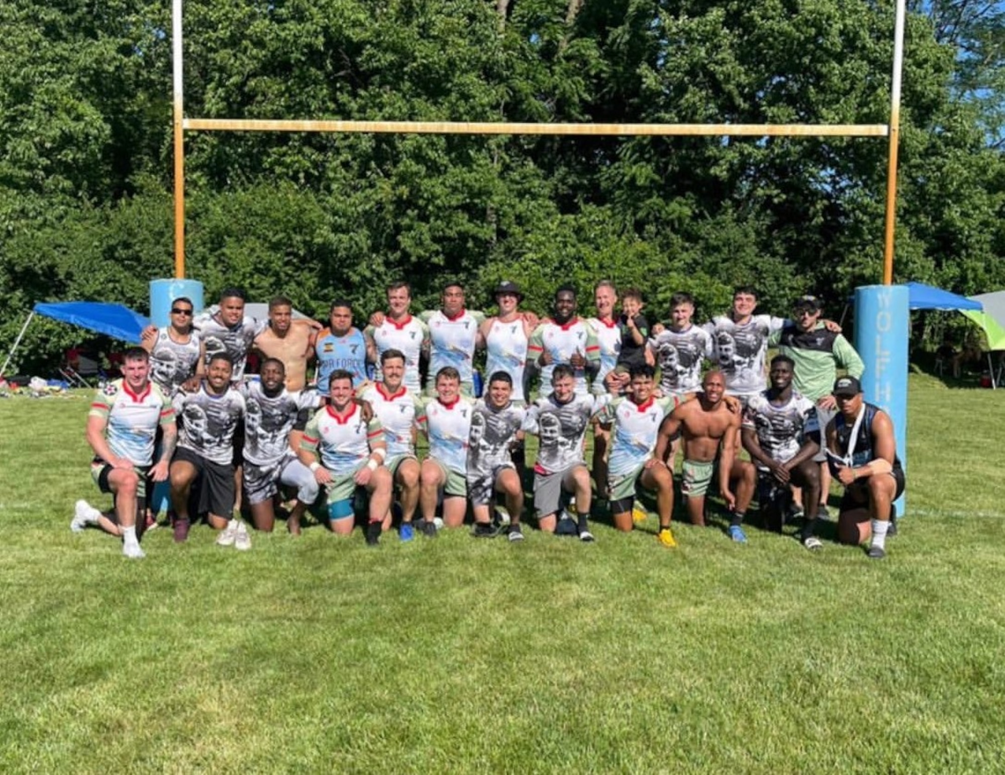 Rugby team picture on playing field.
