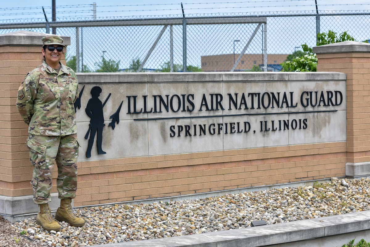 Chief Master Sgt. Teresa Ray poses for a photo outside of the 183d Wing