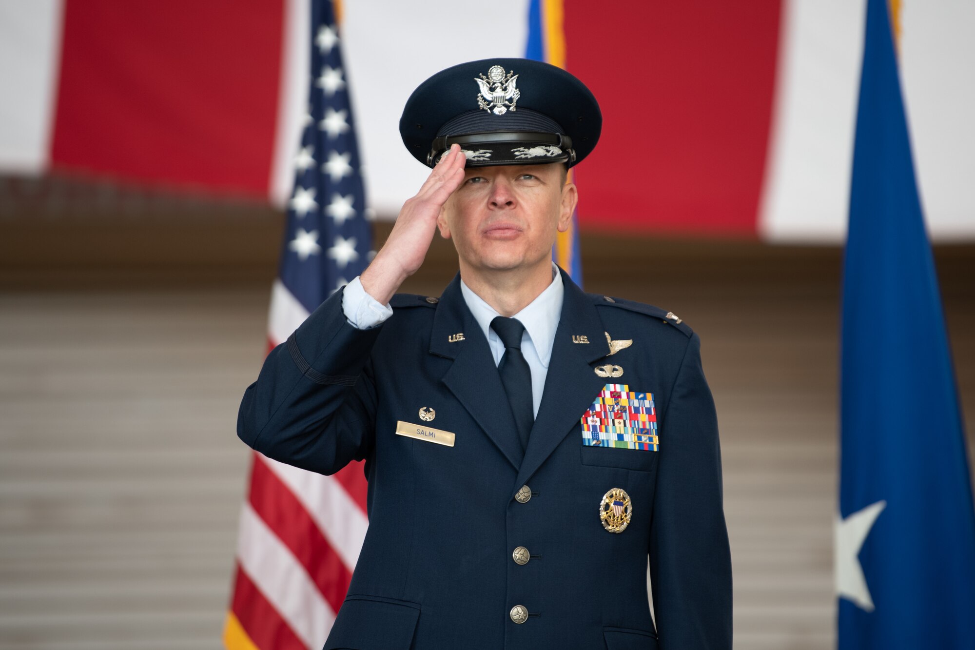 A higher ranking Airman salutes.