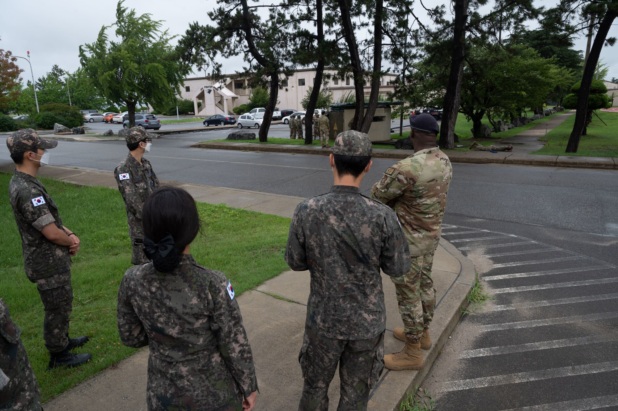 USAF and ROKAF Airmen views an augmentee training