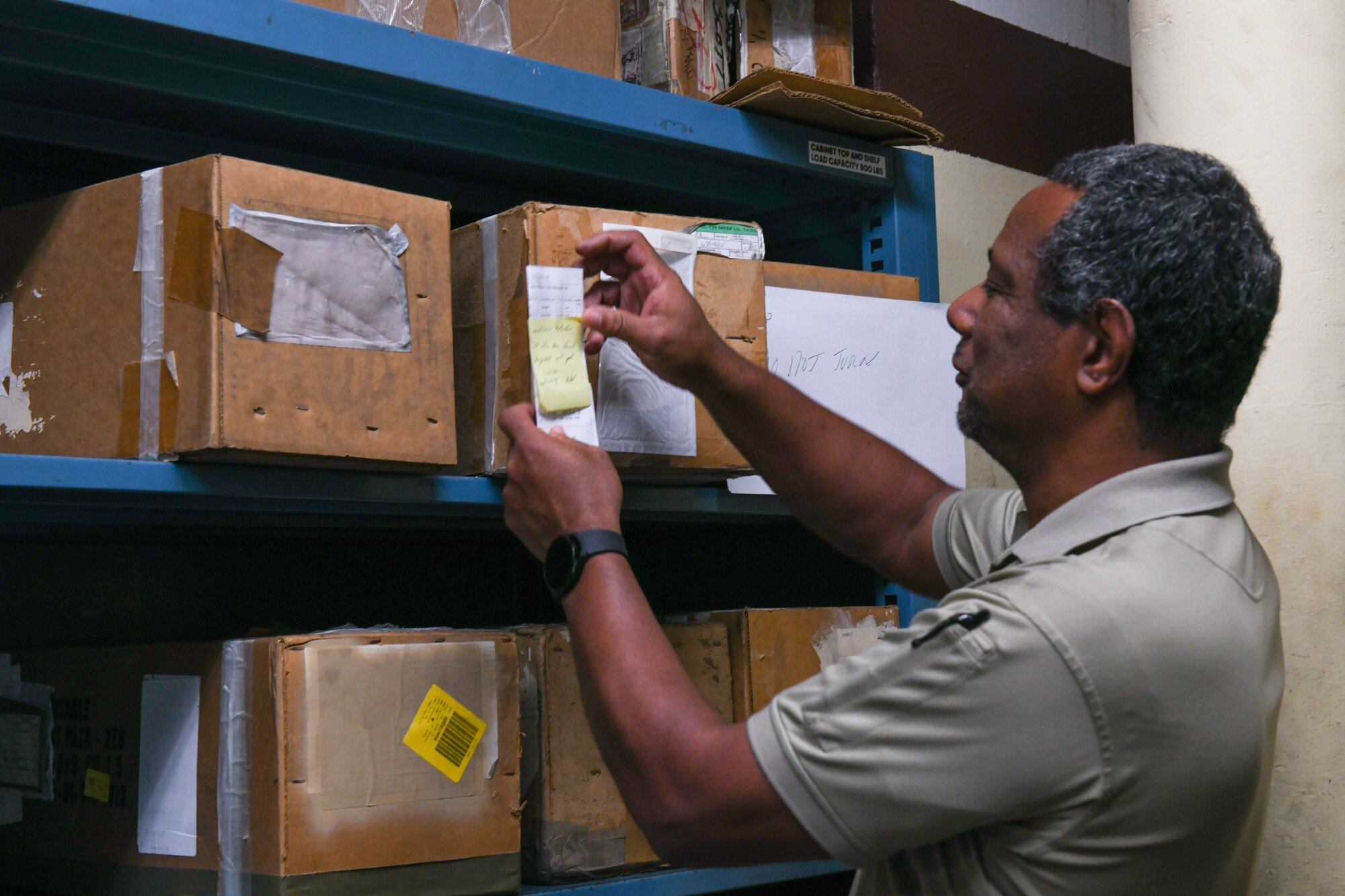 Peter Chase, 97th Maintenance Squadron (MXS) hydraulic section supervisor, checks inventory at Altus Air Force Base (AFB), Oklahoma, July 27, 2022. The 97th MXS received 25 hydraulic actuators from Hill AFB, Utah, to repair in order to keep the fleet operational. (U.S. Air Force photo by Airman 1st Class Miyah Gray)