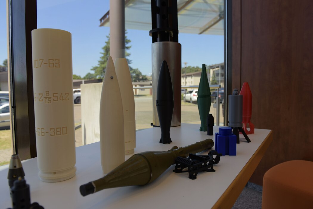 3D printed unexploded ordnances sit on table