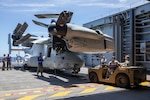 HMAS Canberra Stows an Osprey for The First Time at Sea