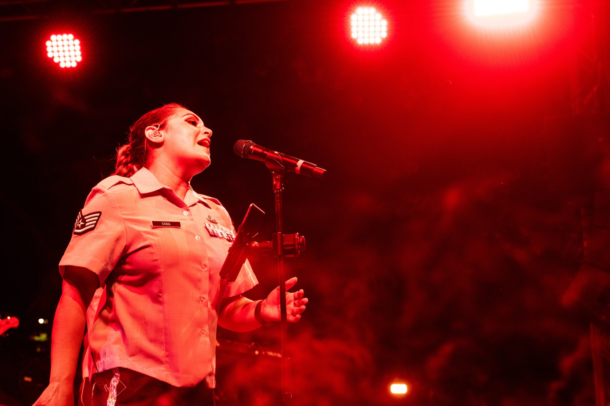 U.S. Air Force Staff Sgt. Linda Casul, Air Forces Central Band vocalist, sings at the U.S. Embassy-Egypt Independence Day celebration in Cairo, Egypt, July 20, 2022.