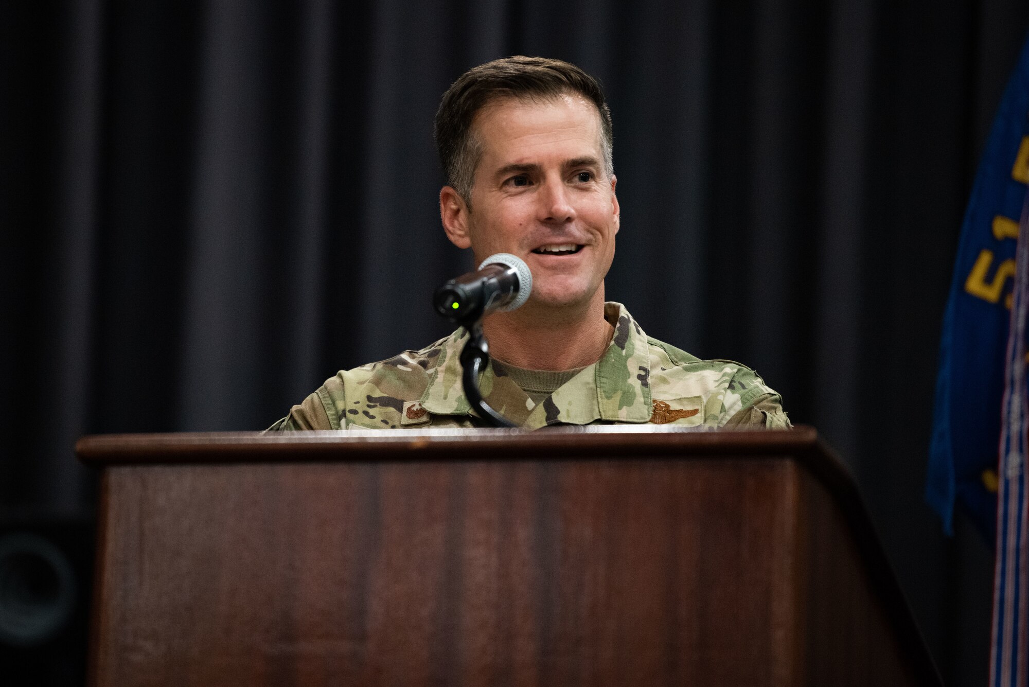 Col. Joshua Wood, 51st Fighter Wing commander, gives opening remarks at the 51st Comptroller Squadron’s assumption of command ceremony at Osan Air Base, Republic of Korea, July 29, 2022.