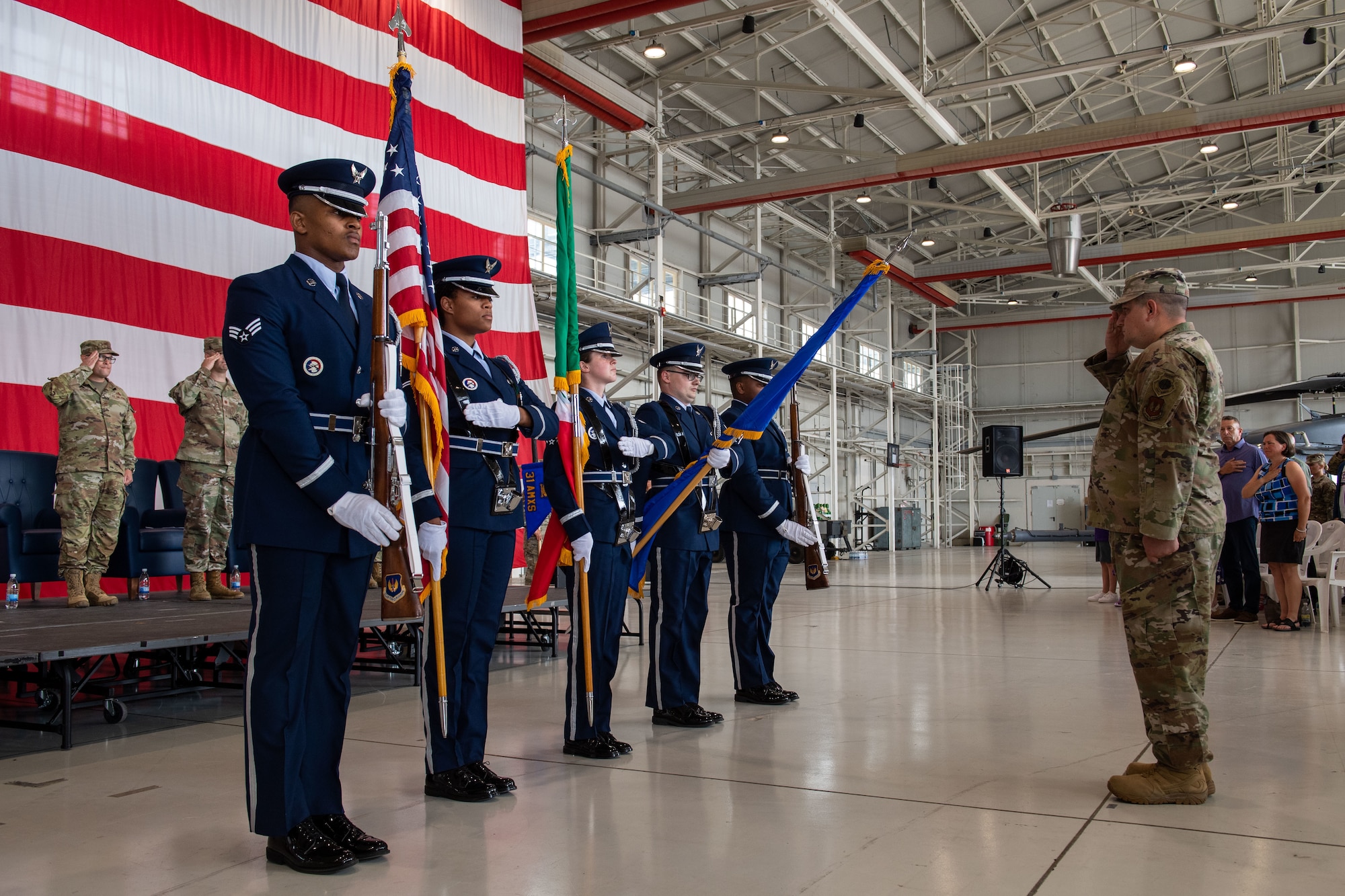 The 31st Fighter Wing Honor Guard presents the colors during the 31st Maintenance Group Reorganization Ceremony