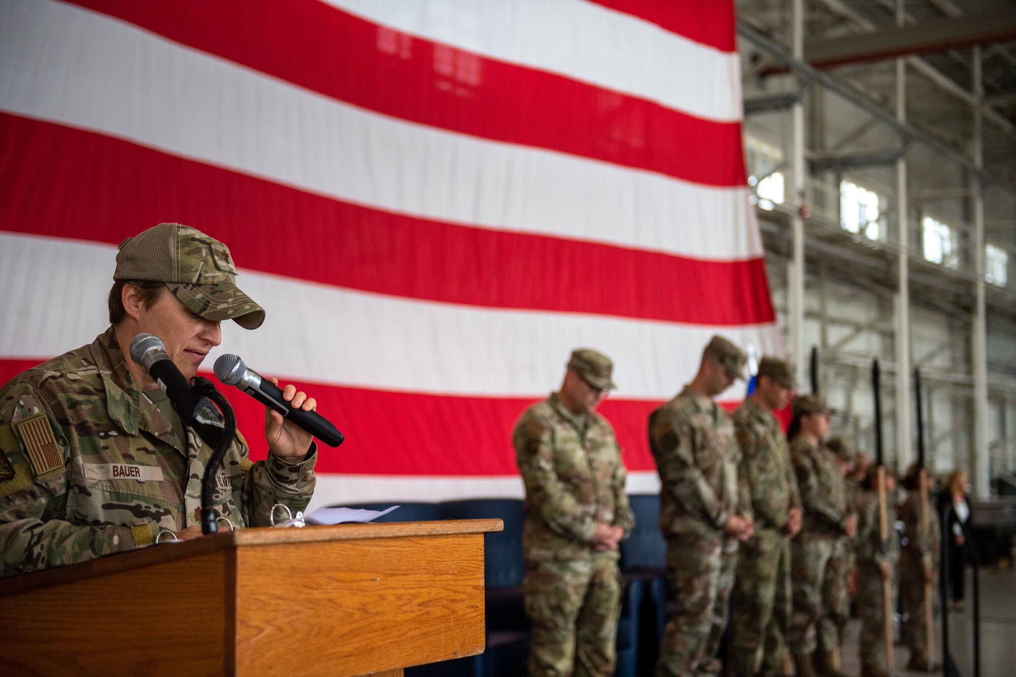 U.S. Air Force Maj. Tara Bauer, 31st Fighter Wing deputy wing chaplain, provides an invocation during the 31st Maintenance Group Reorganization Ceremony
