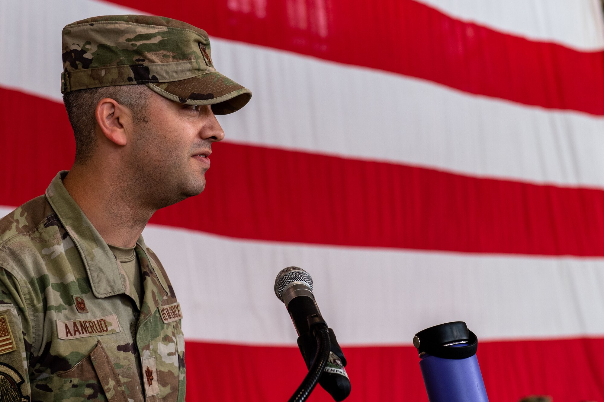 U.S. Air Force Maj. Timothy Aanerud, 510th Fighter Generation Squadron incoming commander, gives his first remarks as incoming commander