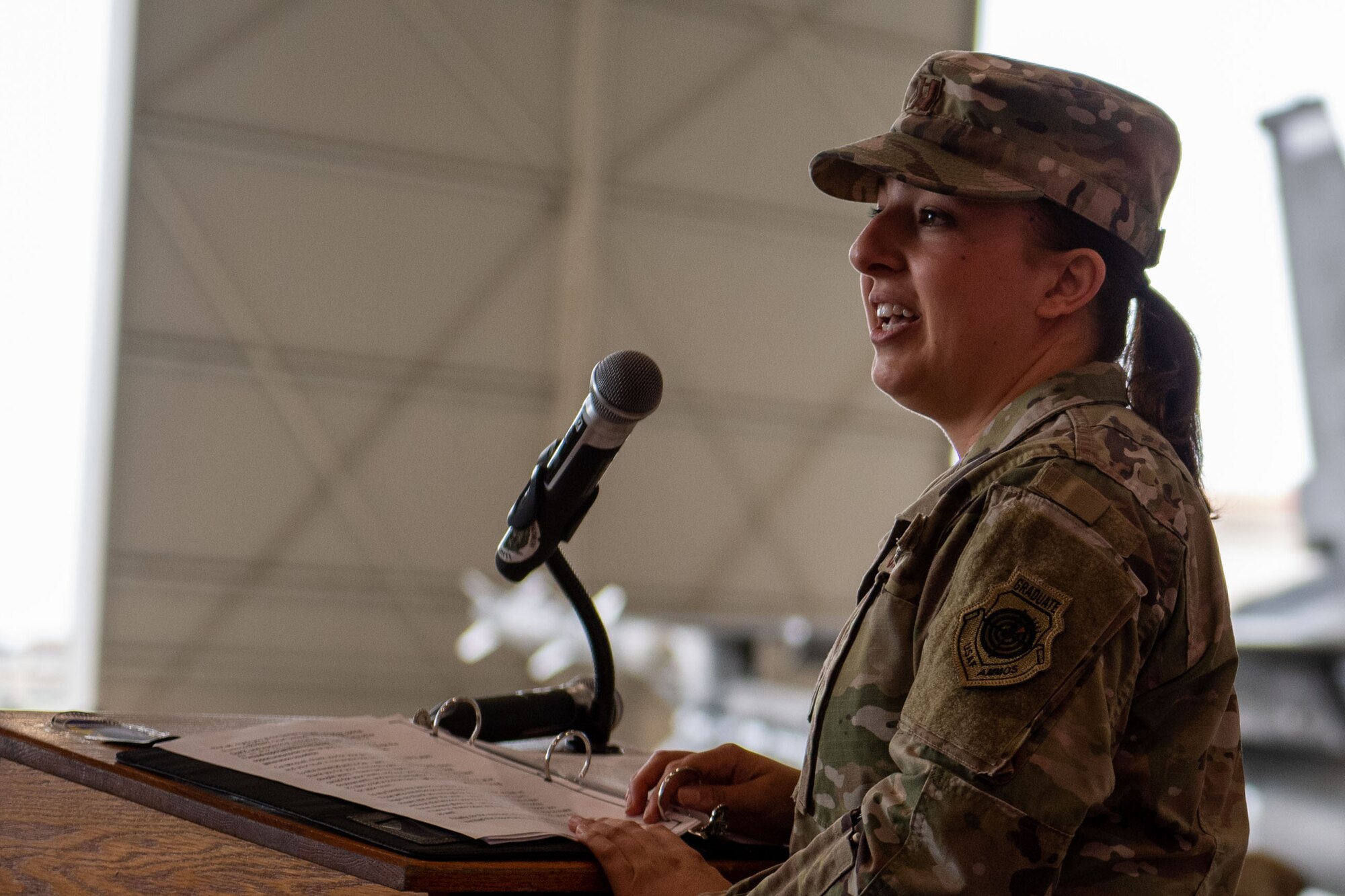 U.S. Air Force Capt. Casey Schindling, 56th Rescue Generation Squadron incoming commander, gives her first remarks as incoming commander