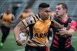 Pennsylvania Air National Guard Capt. Soosoo Taulelei, Director of Personnel Services for the 111th Force Support Squadron at Biddle Air National Guard Base in Horsham, Pennsylvania, was recently selected to represent the Department of the Air Force as a member of its rugby team during the 2022 Armed Forces Men’s Rugby Championship to be held at Glendale, Colorado August 14-22, 2022. Taulelei, formerly an officer with the Army National Guard, is seen here fending off a Navy defender during the 17th annual Commanders Cup rugby match on May 16, 2015 as part of an Army Rugby team from Joint Base Lewis-McChord. (Photo courtesy of Joint Base Lewis McChord Public Affairs Office)