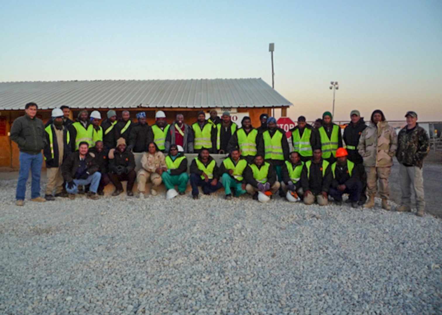 Group photo of people outside in safety equipment