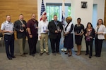 The Head of Contracting Activity Awards for 2021 were presented to the year’s outstanding procurement and contracting professionals May 17 at Coast Guard Headquarters in Washington, DC. From left: Capt. Tad Wilson accepting for Gary Mallory of the Aviation Logistics Center (ALC), Bridge Builder of the Year; Tommy Fout accepting for Petal Donald of the Surface Forces Logistics Center, Rising Star of the Year; Tony Twiddy and Patrick Morris of ALC, members of the Innovative Contracting Team of the Year; Steven Powell with the Director of Operational Logistics – Office of Procurement and Contracting (DOL-9), Supervisor of the Year; Cynthia Clemons and Malita Smith of the Shore Infrastructure Logistics Center (SILC), members of the Outstanding Contracting Team of the Year; Tammy Kao of SILC, Outstanding Contracting Professional of the Year; and Jennifer Souza-Madura with DOL-9, Outstanding Procurement Professional of the Year. U.S. Coast Guard photo by Petty Officer 2nd Class Ronald Hodges. (U.S. Coast Guard photo by Petty Officer 2nd Class Ronald Hodges.)