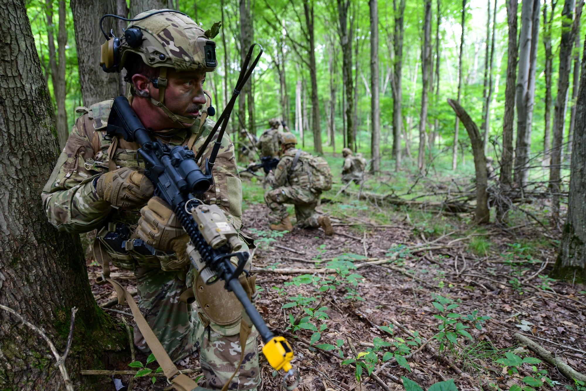 Staff Sgt. Justin Ryan, an Integrated Defense Leadership Course student assigned to the 927th Security Forces Squadron, MacDill Air Force Base, Florida, remains alert during an area security operations exercise at Camp James A. Garfield Joint Military Training Center, Ohio, July 27, 2022.