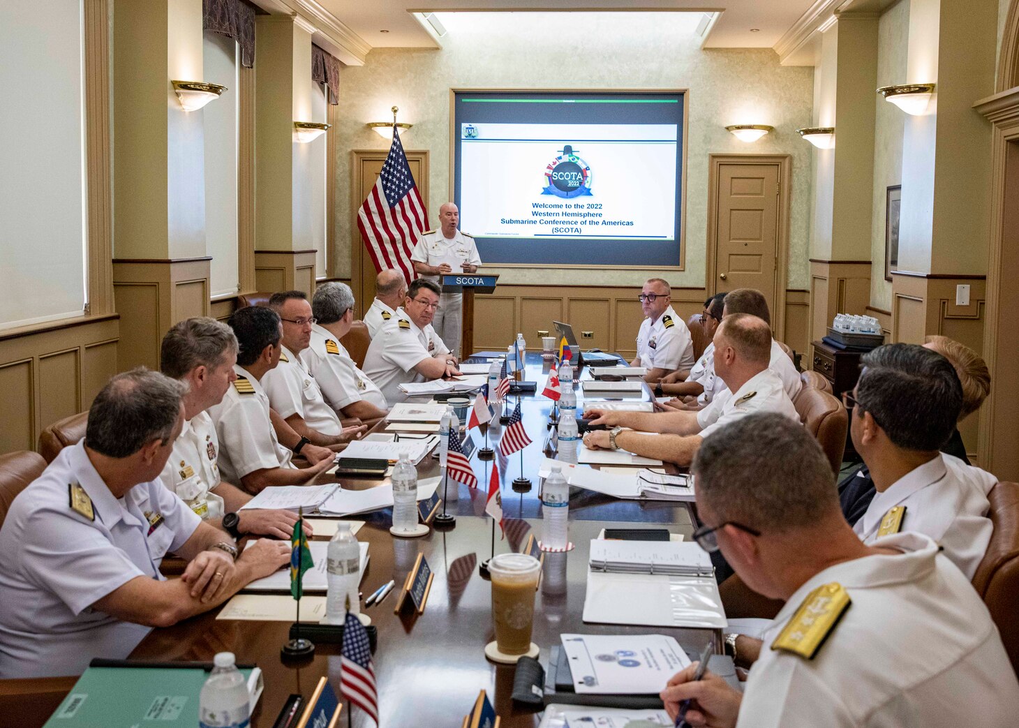 Vice Adm. William Houston, commander, Submarine Forces, addresses participants during the inaugural Submarine Conference of the Americas (SCOTA) onboard Naval Station Norfolk, July 26, 2022.