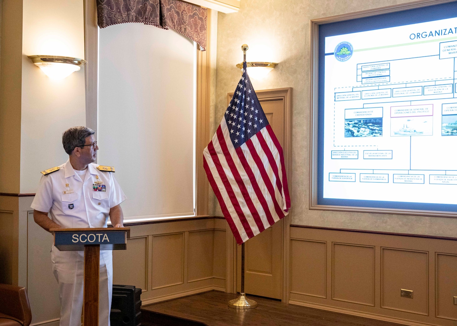 Rear Adm. Carlos Alfonso Saz Garcia, commander, Submarine Forces, Peruvian navy, conducts a presentation during the inaugural Submarine Conference of the Americas (SCOTA) onboard Naval Station Norfolk, July 26, 2022.