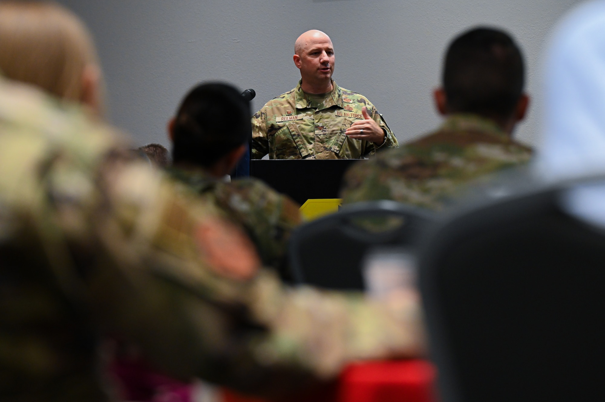 U.S. Air Force Col. Matthew Reilman, 17th Training Wing commander, speaks to the Senior Leader Summit at the Powell Event Center, Goodfellow Air Force Base, Texas, July 26, 2022. Reilman expressed his desire for leadership to communicate to their units the focus of the wing’s mission, and share best practices to implement the wing vision in every aspect of daily work. (U.S. Air Force photo by Senior Airman Michael Bowman)