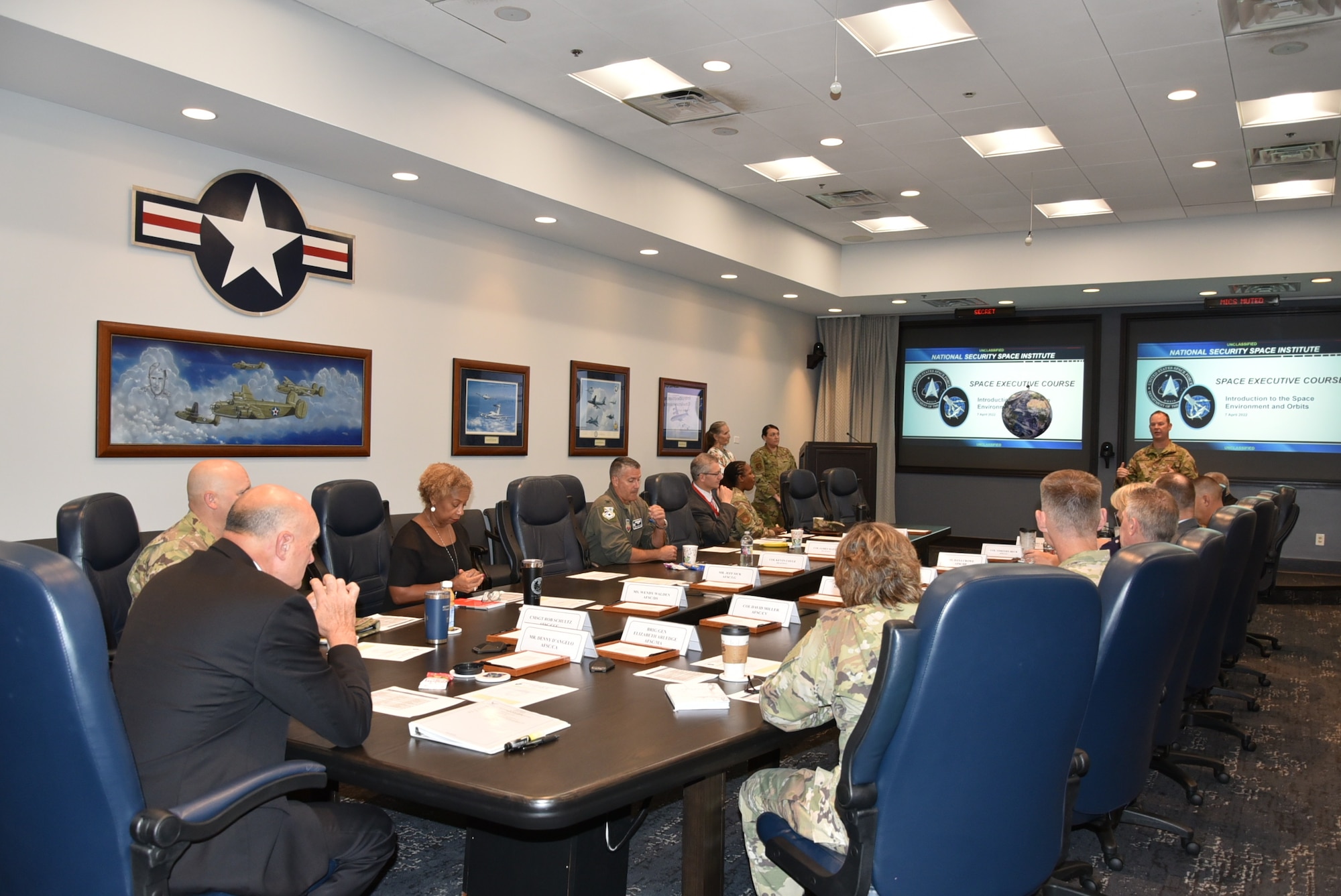 Air Force Sustainment Center Command Team Members and Senior Leaders attend the Space Executive Course, presented by the National Security Space Institute, at AFSC Headquarters, Tinker Air Force Base, Okla., here, July 14, 2022. The SEC is a two-day course that provides senior members of the DOD, other U.S. government agencies, and allied nations with an overview of the U.S. Space Force at the executive level.