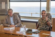 The Honorable John P. Coffey, left, head of the office of the General Counsel, Department of the Navy, and U.S. Marine Corps Col. Speros Koumparakis, commanding officer, Marine Corps Base Hawaii, participate in a brief during a visit to MCBH, July 21, 2022. The purpose of the visit was to inform Mr. Coffey on the base’s progression toward Force Design 2030. (U.S. Marine Corps photo by Cpl. Samantha Sanchez)
