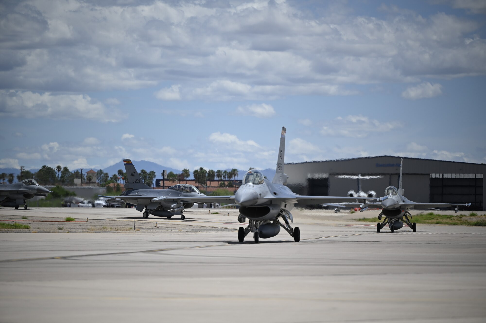 The last four F-16s belonging to the Royal Netherlands Air Force taxi after landing here today at the Morris Air National Guard Base in Tucson. The Dutch were the first in a long line of foreign partners to train at Morris ANG Base, flying an average of 2,000 hours per year in the F-16 and graduating four student pilots every nine months as part of the 148th Fighter Squadron. (U.S. Air National Guard photo by Maj. Angela Walz)