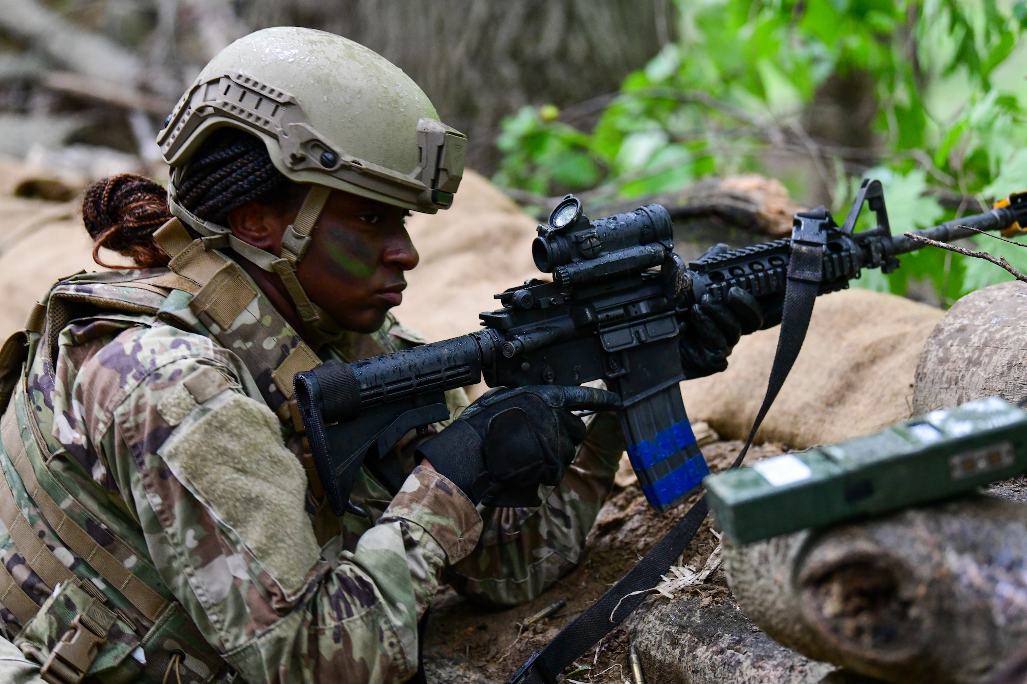 Airman 1st Class Kiana Glasker, an Integrated Defense Leadership Course student assigned to the 94th Security Forces Squadron, Dobbins Air Reserve Base, Georgia watches for movement during a static defense exercise at Camp James A. Garfield Joint Military Training Center, Ohio, July 27, 2022.