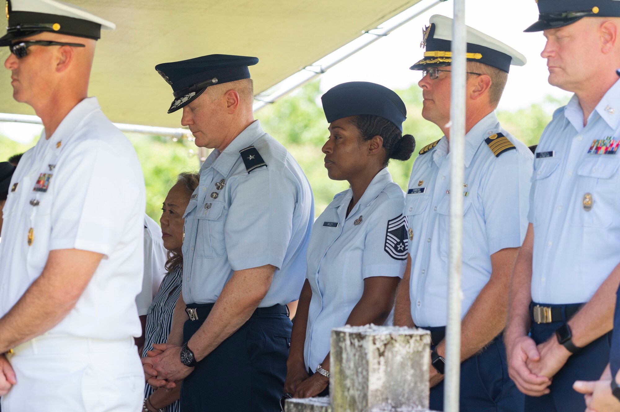 Military members standing up.