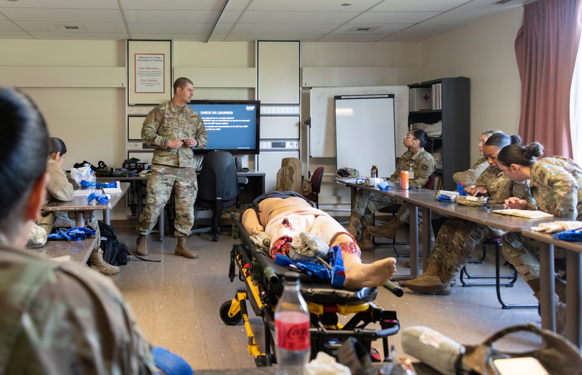 U.S. Airmen attend medical readiness tactical combat casualty care training at David Grant USAF Medical Center, Travis Air Force Base, California, April 28, 2022.