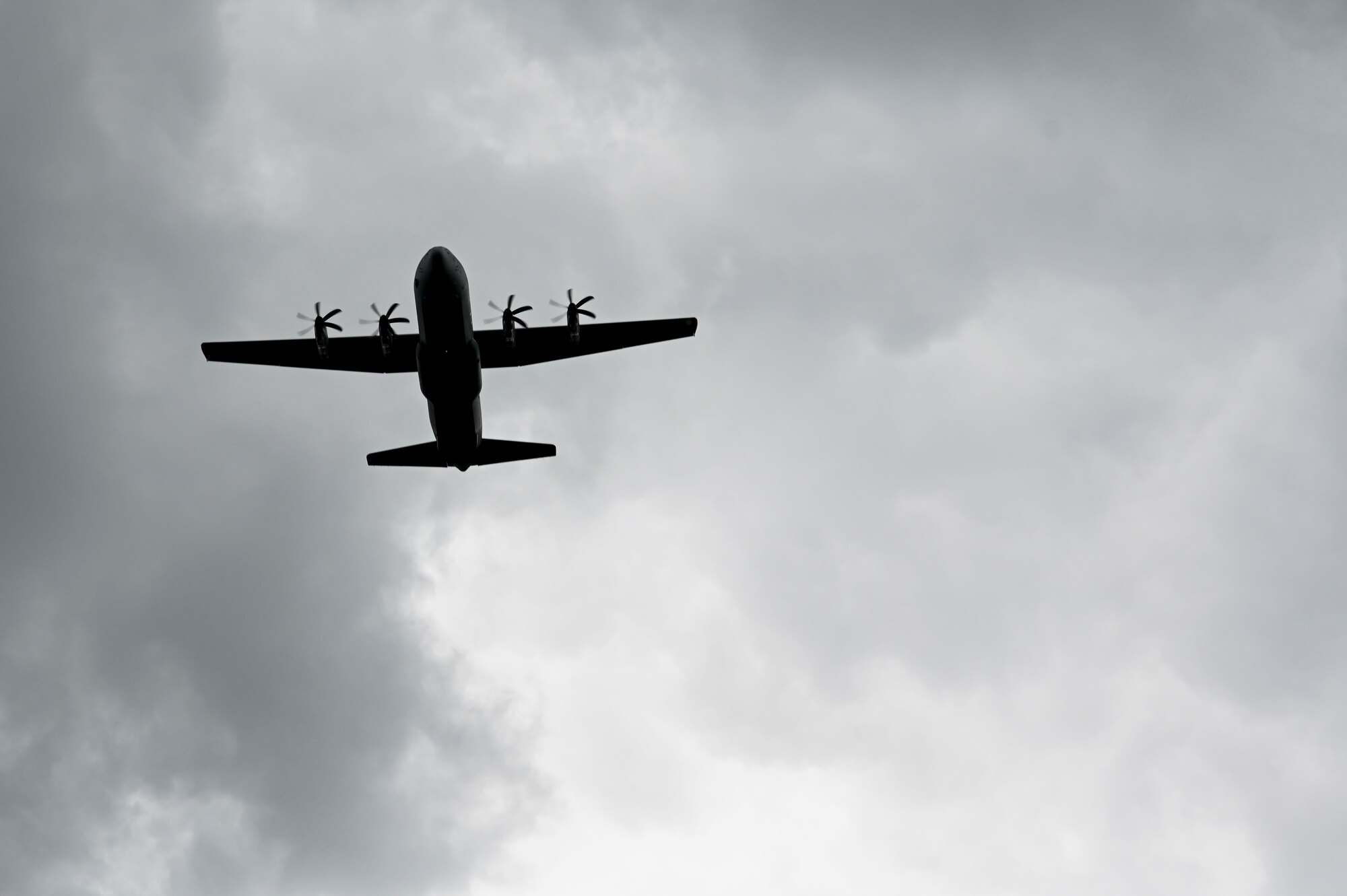 A C130-J Hercules, assigned to the 37th Airlift Squadron, Ramstein Air Base, Germany, flies over the Luxembourg American Military Cemetery in Luxembourg, during a Memorial Day event on May 28, 2022. This event is held to honor and recognize the service and sacrifice of over 5,000 Americans. (U.S. Air Force photo by Airman 1st Class Jessica Sanchez-Chen)