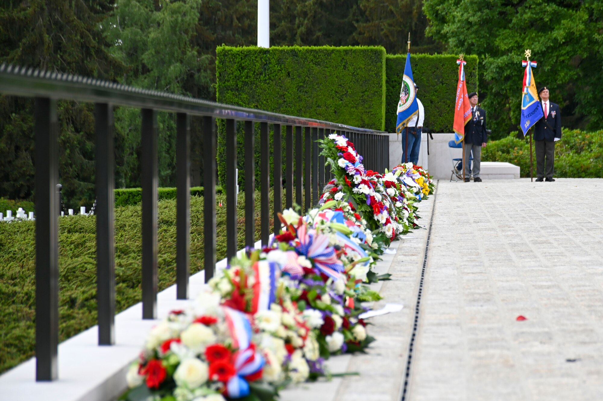 Wreaths lay on the ground during a Memorial Day event at the Luxembourg American Military cemetery in Luxembourg, May 28, 2022. U.S. and Luxembourg organizations laid wreaths in honor of the fallen service members. (U.S. Air Force photo by Airman 1st Class Jessica Sanchez-Chen)