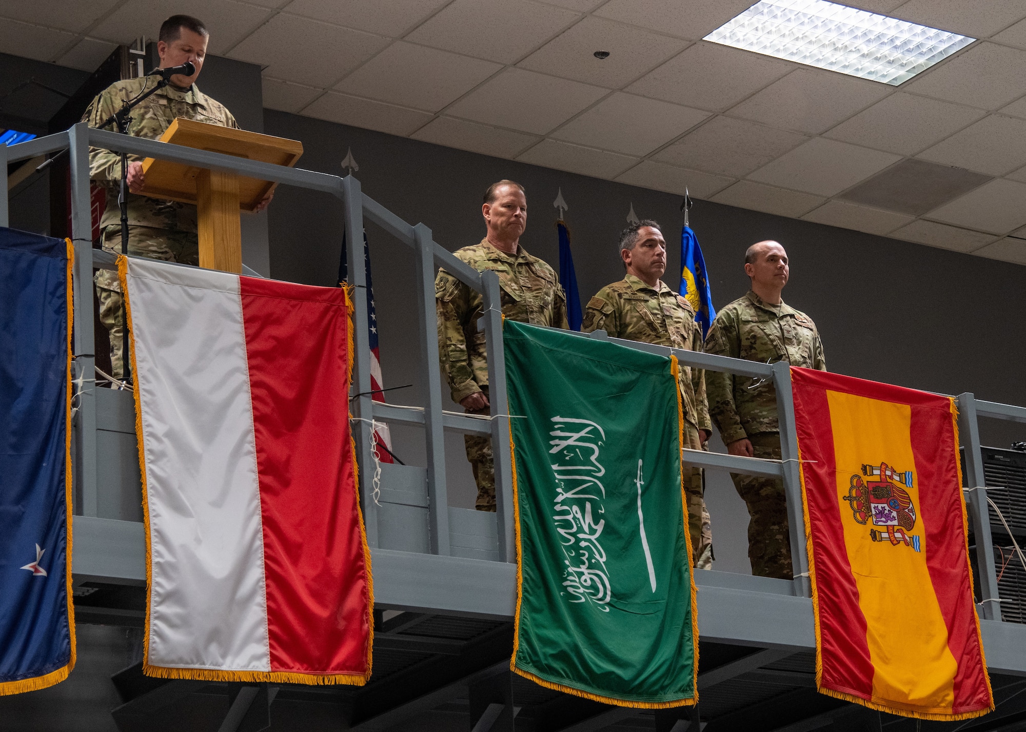 U.S. Air Force Maj. Gen. David Meyer (left), Deputy Commander, Ninth Air Force (Air Forces Central), U.S. Air Force Col. Joshua Koslov (center), former 609th Air Operations Center commander, and U.S. Air Force Col. Kevin M. Ogle (right), new 609th AOC commander, stands during a change of command ceremony at the Combined Air Operations Center at Al Udeid Air Base, Qatar, May 25, 2022. The CAOC is comprised of a joint and coalition team that executes day-to-day combined air and space operations and provides rapid reaction, positive control, coordination, and de-confliction of weapon systems. (U.S. Air Force photo by Staff Sgt. Collette Brooks)