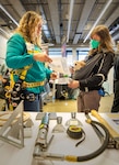 Women representing more than a dozen shops and codes at Puget Sound Naval Shipyard & Intermediate Maintenance Facility participate in the 2022 Women in Trades Fair at the Seattle Center, May 6, 2022. The fair is organized by the Washington Women in Trades Association and has been held for more than 40 years. The fair offers an opportunity for women in trades to gather, teach, learn, recruit and inspire. (U.S. Navy photo by Wendy Hallmark)
