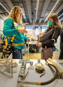 Women representing more than a dozen shops and codes at Puget Sound Naval Shipyard & Intermediate Maintenance Facility participate in the 2022 Women in Trades Fair at the Seattle Center, May 6, 2022. The fair is organized by the Washington Women in Trades Association and has been held for more than 40 years. The fair offers an opportunity for women in trades to gather, teach, learn, recruit and inspire. (U.S. Navy photo by Wendy Hallmark)