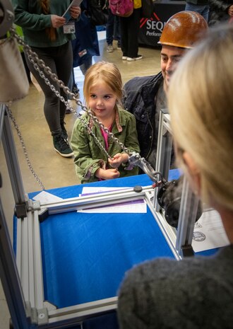 Women representing more than a dozen shops and codes at Puget Sound Naval Shipyard & Intermediate Maintenance Facility participate in the 2022 Women in Trades Fair at the Seattle Center, May 6, 2022. The fair is organized by the Washington Women in Trades Association and has been held for more than 40 years. The fair offers an opportunity for women in trades to gather, teach, learn, recruit and inspire. (U.S. Navy photo by Wendy Hallmark)