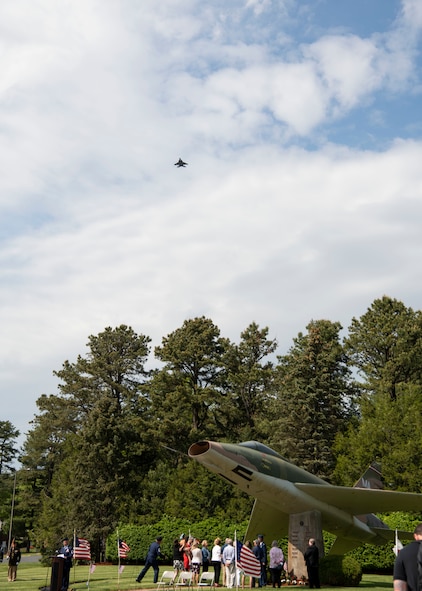 Barnestomers honor the 13 Airmen fallen in flight from the 104th Fighter Wing during the F-100 memorial rededication ceremony, May 20, 2022, at Barnes Air National Guard Base, Massachusetts. The F-100 monument was originally dedicated on May 17, 1987 by the 104FW Chief Master Sergeant’s Council. It continues to serve as a reminder of fallen Airmen’s impact on the unit.(U.S. Air National Guard photo by Staff Sgt. Hanna Smith)