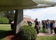 Barnestomers honor the 13 Airmen fallen in flight from the 104th Fighter Wing during the F-100 memorial rededication ceremony, May 20, 2022, at Barnes Air National Guard Base, Massachusetts. The F-100 monument was originally dedicated on May 17, 1987 by the 104FW Chief Master Sergeant’s Council. It continues to serve as a reminder of fallen Airmen’s impact on the unit.(U.S. Air National Guard photo by Staff Sgt. Hanna Smith)