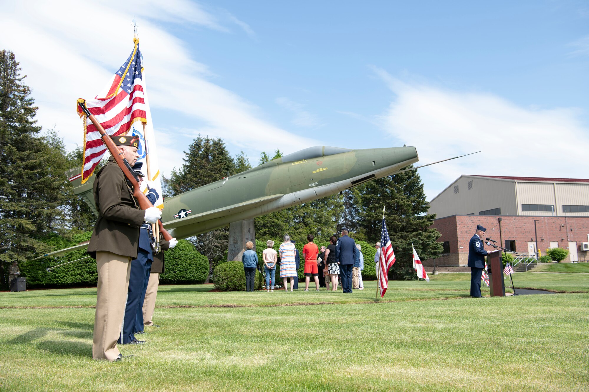 Barnestomers honor the 13 Airmen fallen in flight from the 104th Fighter Wing during the F-100 memorial rededication ceremony, May 20, 2022, at Barnes Air National Guard Base, Massachusetts. The F-100 monument was originally dedicated on May 17, 1987 by the 104FW Chief Master Sergeant’s Council. It continues to serve as a reminder of fallen Airmen’s impact on the unit.(U.S. Air National Guard photo by Staff Sgt. Hanna Smith)